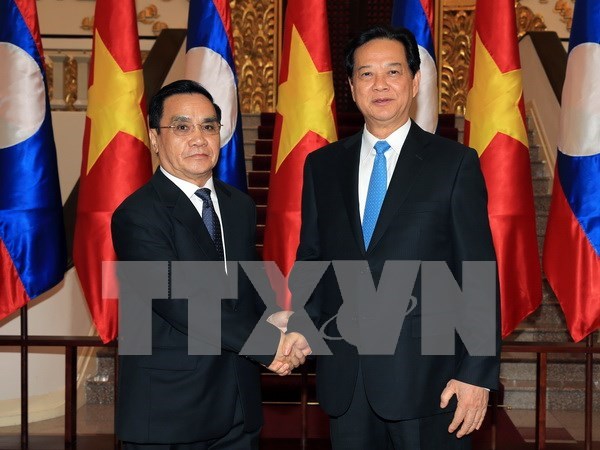 Vietnam y Laos determinados a aumentar cooperacion comercial hinh anh 1