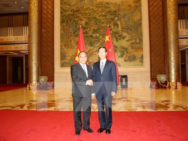 Intensifican cooperacion entre Vietnam y China hinh anh 1