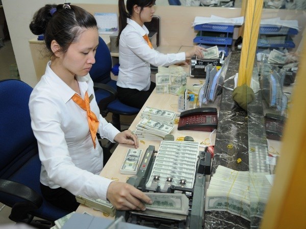 Banco Estatal de Vietnam reajusta tasa de interes pasiva en dolar hinh anh 1