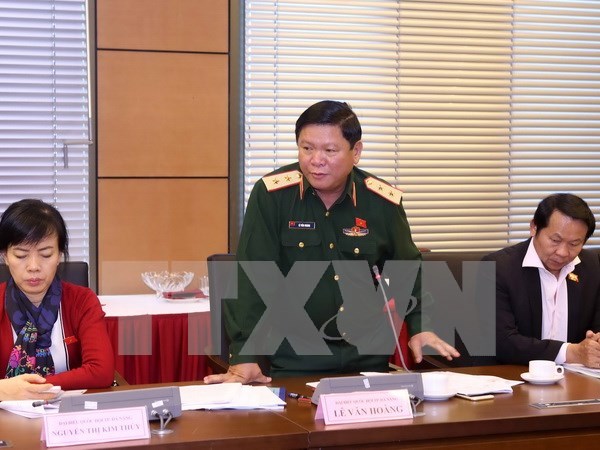 Parlamento vietnamita continua revisando proyectos legales hinh anh 1