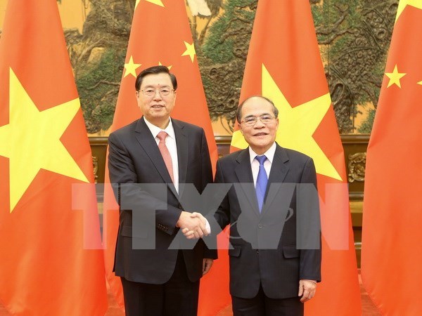 Se reunen en Beijing dirigentes parlamentarios de Vietnam y China hinh anh 1