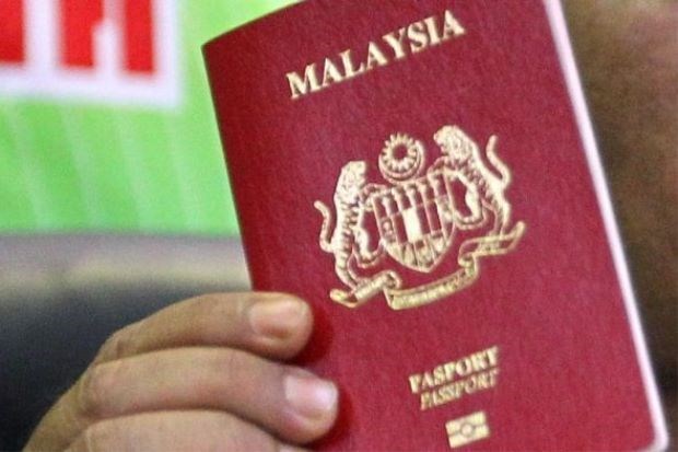 Malasia aniquila red clandestina de falsificacion de pasaportes hinh anh 1