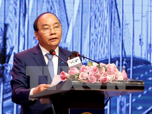 Premier exhorta a Hanoi a renovarse para aumentar atraccion de inversiones hinh anh 1