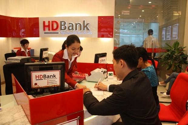 Bancos de Vietnam y Japon firman acuerdos de cooperacion hinh anh 1