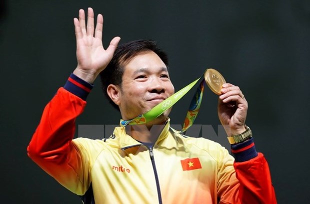 Hoang Xuan Vinh gana primer oro para Vietnam en los Juegos Olimpicos hinh anh 1