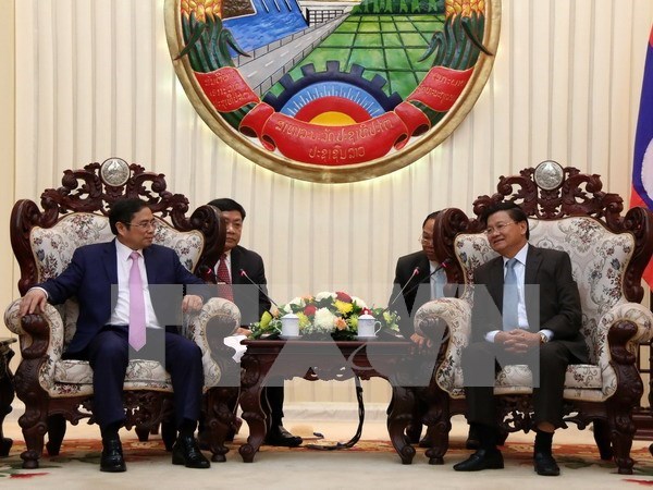 Firman Vietnam y Laos acuerdo de cooperacion partidista hinh anh 1