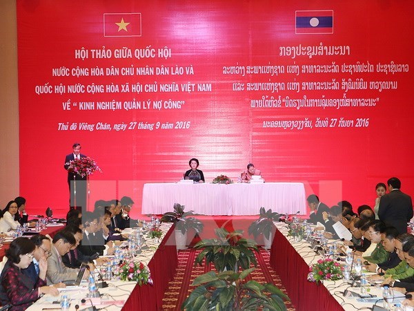Vietnam y Laos comparten experiencias en la gestion de deuda publica hinh anh 1