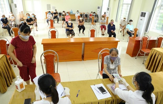 Confianza publica es clave para respuesta exitosa al COVID-19 en Vietnam hinh anh 1