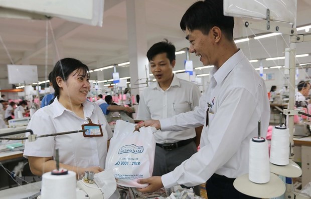 Priorizan respaldo a trabajadores vietnamitas en ocasion del Tet hinh anh 1