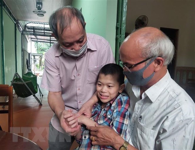 60 anos de desastre del Agente Naranja en Vietnam: Unir esfuerzos para aliviar el dolor hinh anh 3