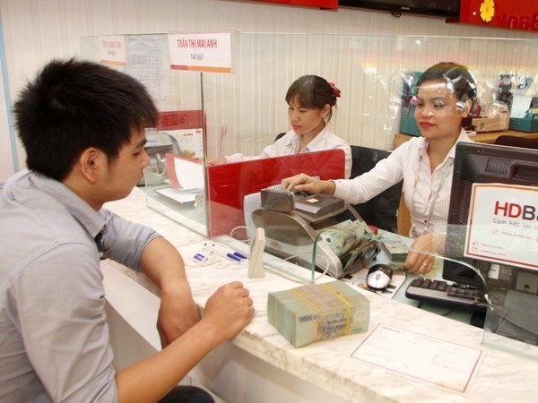 Tasa de interes bancario en Vietnam mantendra tendencia a estabilidad en 2022 hinh anh 2