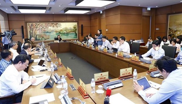 Parlamento vietnamita debaten cuestiones relativas a gestion de autos hinh anh 1