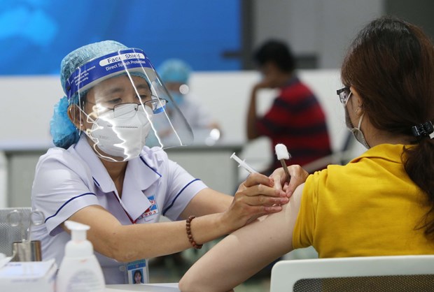 Ciudad Ho Chi Minh planea completar vacunacion de refuerzo contra el COVID-19 en enero hinh anh 1