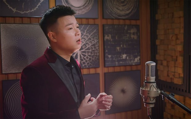 Video musical anima el espiritu contra pandemia de Ciudad Ho Chi Minh hinh anh 1