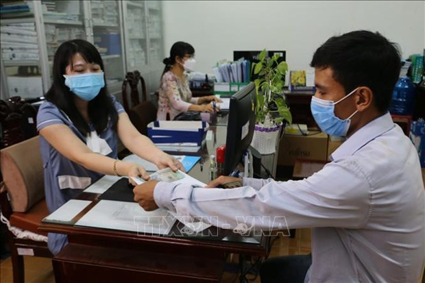 Vietnam garantiza bienestar social de las personas durante contexto de COVID-19 hinh anh 1