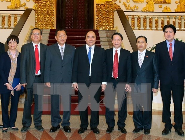 Premier pide a agencias de noticias de Vietnam y Laos a fomentar cooperacion bilateral hinh anh 1