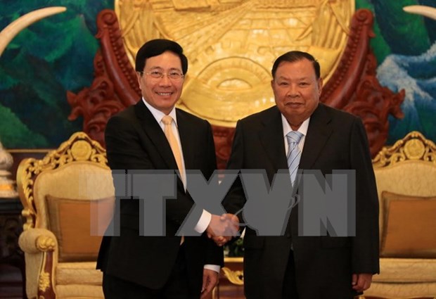 Canciller de Vietnam efectua visita oficial a Laos hinh anh 1