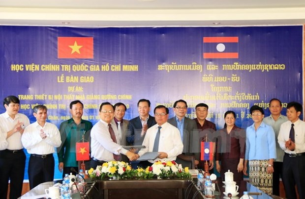 Vietnam ayuda a Laos a modernizar academia de politica hinh anh 1