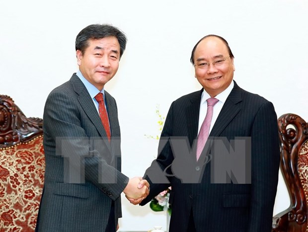 Premier de Vietnam recibe al presidente de Yonhap hinh anh 1