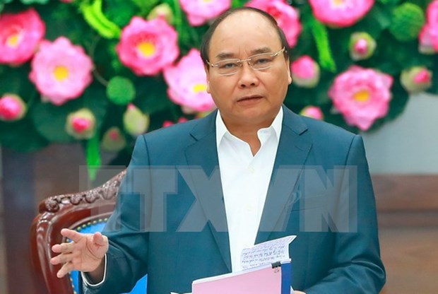 Premier de Vietnam urge a disenar escenarios de desarrollo para alcanzar objetivo de crecimiento hinh anh 1