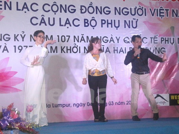 Destacan contribucion de mujeres vietnamitas en ultramar al desarrollo nacional hinh anh 1