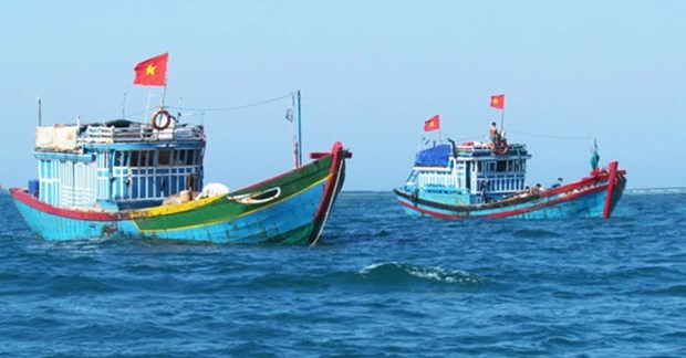 Pescadores vietnamitas rescatados en aguas de Tailandia regresan a casa hinh anh 1
