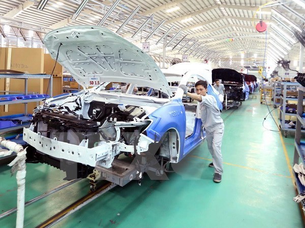 Empresas vietnamitas y chinas cooperan en produccion de piezas de vehiculos pesados hinh anh 1