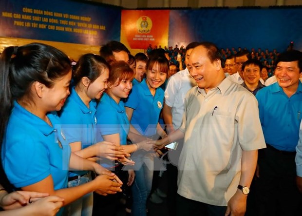 Premier vietnamita pide mayor atencion a los trabajadores hinh anh 1