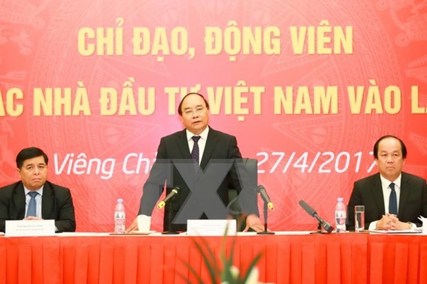 Primer ministro de Vietnam prosigue actividades en Laos hinh anh 1