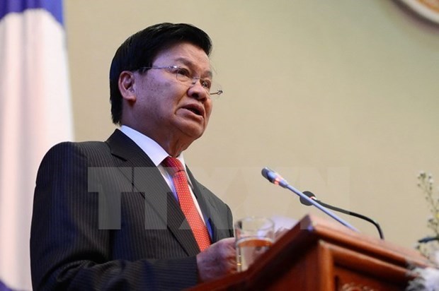 Primer ministro de Laos realiza visita oficial a Singapur hinh anh 1