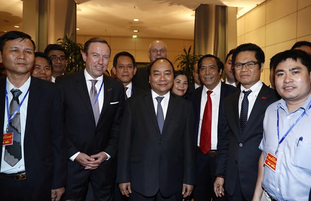 Premier vietnamita recaba apoyo empresarial en confeccion de politicas economicas hinh anh 1