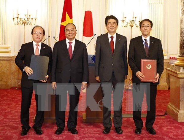 Premier de Vietnam continua con intensa agenda de actividades en Japon hinh anh 1