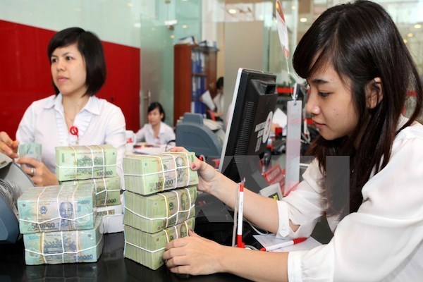 Bancos extranjeros y nacionales en Vietnam interesados en sector minorista hinh anh 1