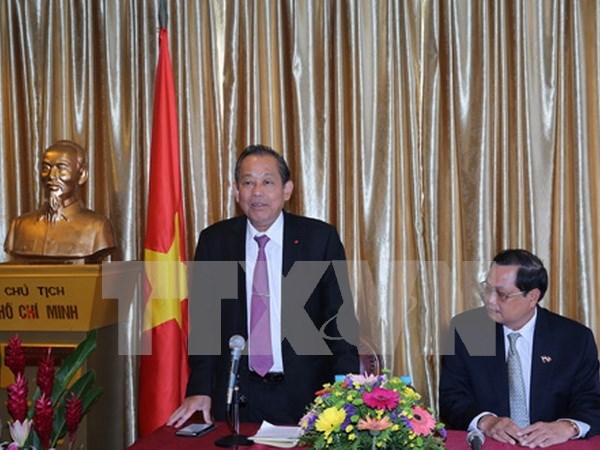 Vicepremier aprecia contribucion de comunidad vietnamita en Singapur al desarrollo nacional hinh anh 1
