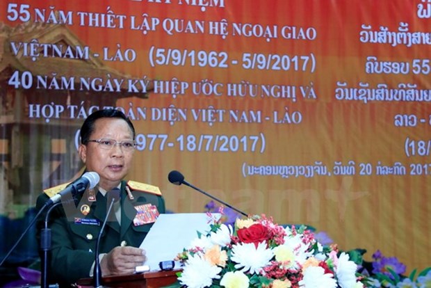 Ministerio de Defensa de Laos celebra aniversario 55 de relaciones con Vietnam hinh anh 1