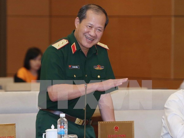 Vietnam y Laos profundizan cooperacion en defensa hinh anh 1