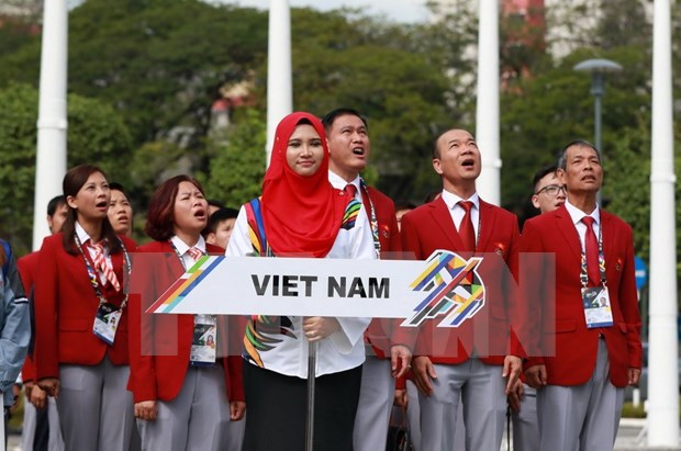 Izada bandera nacional de Vietnam en SEA Games 29 en Malasia hinh anh 1