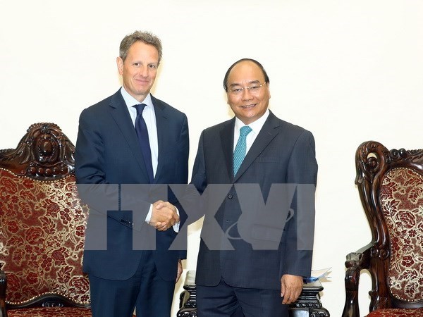 Premier vietnamita dialoga con presidente de grupo Warburg Pincus hinh anh 1