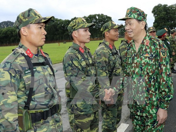 Presidente de Vietnam enfatiza en labor de defensa asociada con desarrollo socioeconomico hinh anh 1