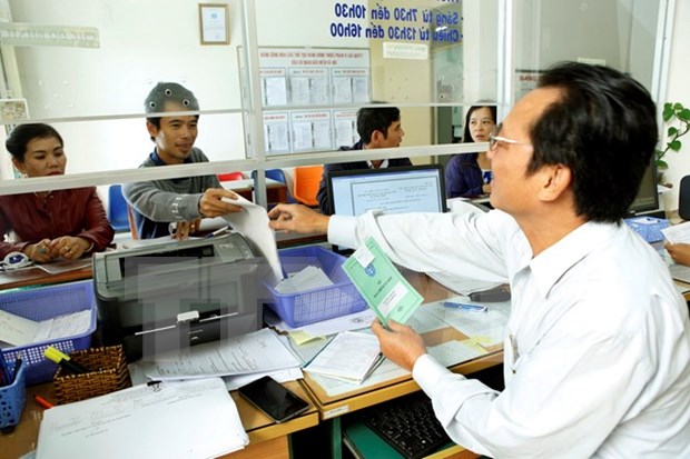 Vietnam impulsa calidad de servicios medicos brindados segun politicas de Seguro Social hinh anh 1