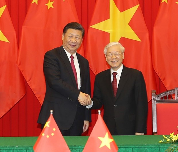 Vietnam y China firman diferentes acuerdos de cooperacion hinh anh 1