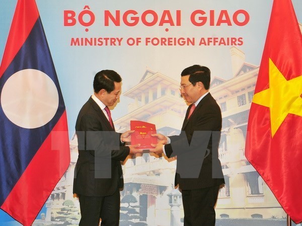 Efectuan consulta a nivel ministerial entre Vietnam y Laos hinh anh 1