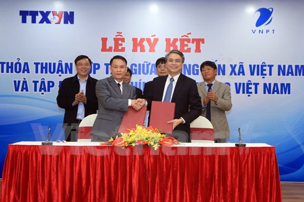 Agencia Vietnamita de Noticias y Grupo de Correos y Telecomunicaciones fomentan cooperacion en labor informativa hinh anh 1