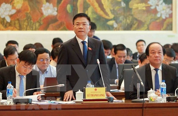 Ministro de Justicia de Vietnam comparece ante el Parlamento hinh anh 1