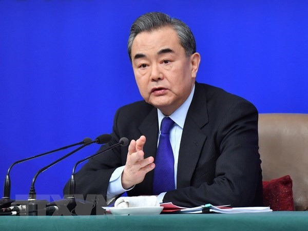 Vietnam congratula a Wang Yi por su ascenso como Consejero del Estado de China hinh anh 1