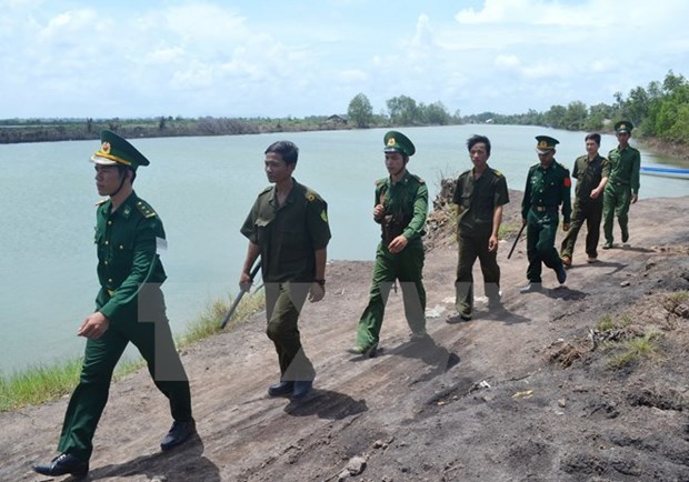 Viceministro de Defensa de Laos visita escuela de la fuerza guardafronteriza de Vietnam hinh anh 1