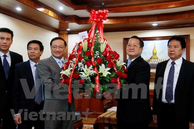 Vietnam felicita 63 anos de fundacion del Partido Popular Revolucionario de Laos hinh anh 1