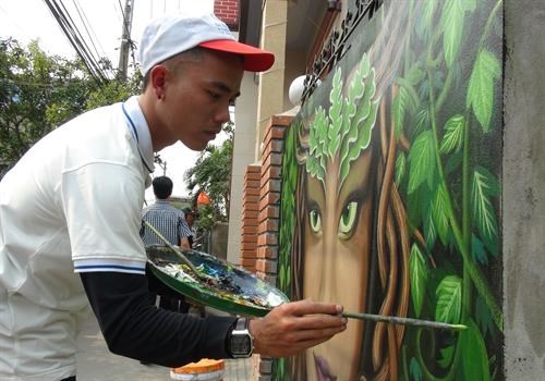 Comuna de pinturas murales, emergente destino turistico en Quang Binh hinh anh 1