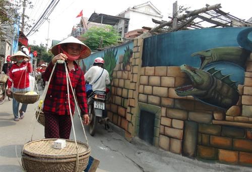 Comuna de pinturas murales, emergente destino turistico en Quang Binh hinh anh 2