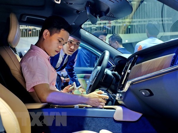 Especialistas britanicas preven alta demanda de autos en Vietnam hinh anh 1